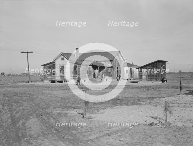 Cotton workers, outskirts of Firebaugh, west side of San Joaquin Valley, California, 1939. Creator: Dorothea Lange.