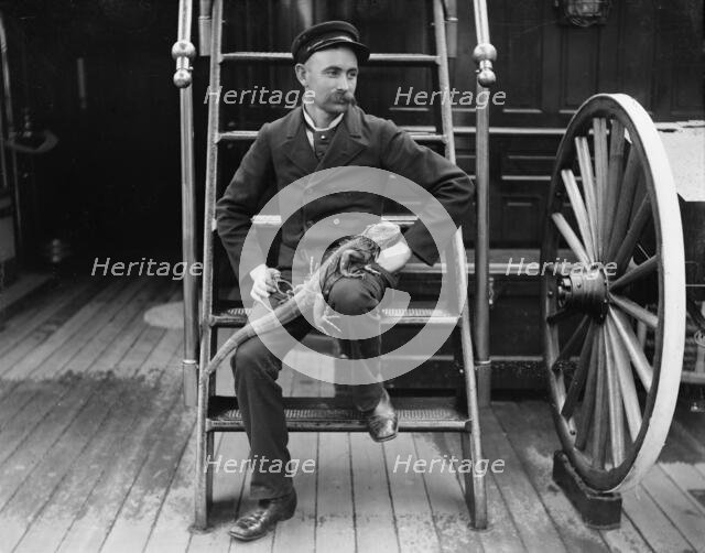 U.S.S. New York, Admiral Sampson's steward and his pet, between 1893 and 1901. Creator: Edward H Hart.