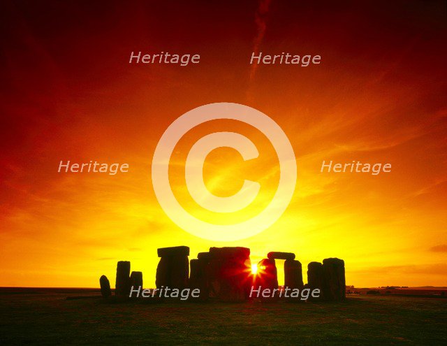 Stonehenge sunset, Wiltshire. Artist: Unknown.
