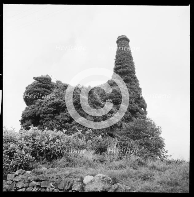 Ivy covered mine engine house and chimney, Cornwall, 1967. Creator: Eileen Deste.