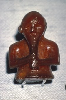 Amber Playing-Piece. Man with Long beard, from Roholte, Denmark, c8th-mid 11th century. Artist: Unknown.