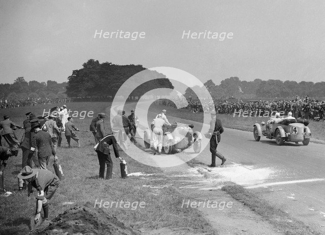 Recovering George Eyston's fire-damaged Bugatti T43, Irish Grand Prix, Phoenix Park Dublin, 1929. Artist: Bill Brunell.