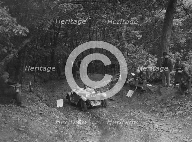Riley Lynx taking part in a motoring trial, c1930s. Artist: Bill Brunell.