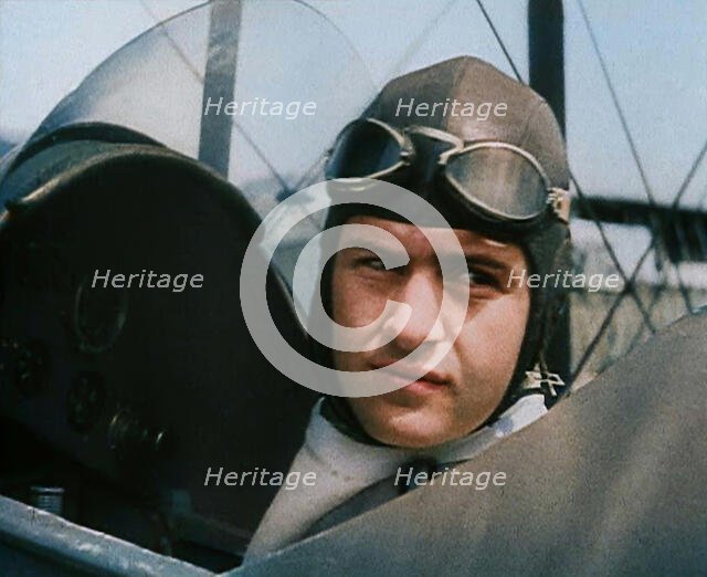 Bruno Mussolini, Son of Italian Leader Benito Mussolini, in Flying Cap Sitting in the..., 1937. Creator: British Pathe Ltd.