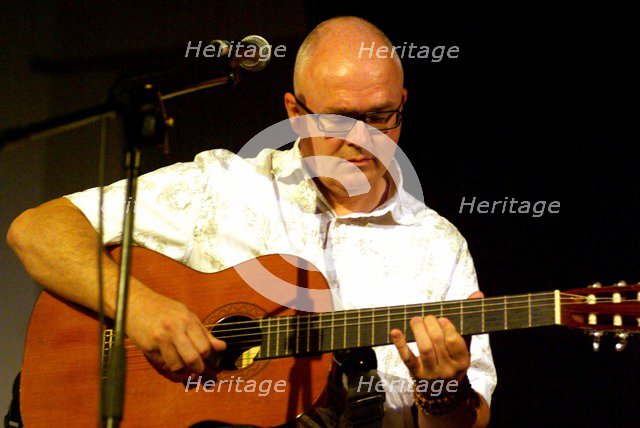 Kevin Armstrong, guitarist, producer, songwriter, and composer, Brecon, 2009. Artist: Brian O'Connor.