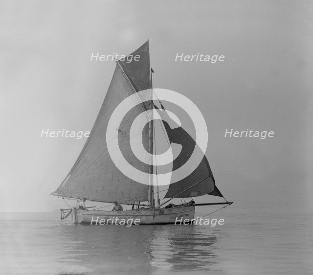 Fishing Smack under sail, 1911. Creator: Kirk & Sons of Cowes.