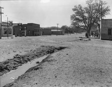 Main street of town showing irrigation ditch, Escalante, Utah, 1936. Creator: Dorothea Lange.