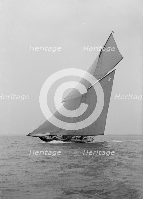 The beautiful 52 ft cutter 'Sonya' sailing close-hauled, 1913. Creator: Kirk & Sons of Cowes.