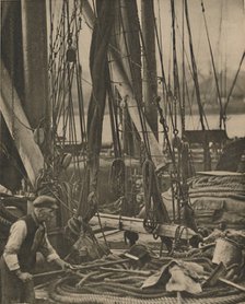 'At the Foot of the Mast on a Thames Barge', c1935. Creator: Walter Benington.