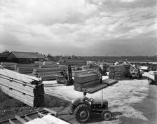 A busy timber yard, Bolton upon Dearne, South Yorkshire, 1960.  Artist: Michael Walters