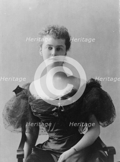 Mrs. Elizabeth Cameron, half-length portrait, seated, facing front, between c1890 and c1910. Creator: Frances Benjamin Johnston.