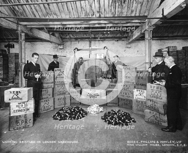 Working with bristles in a warehouse, London, 1938. Artist: Unknown