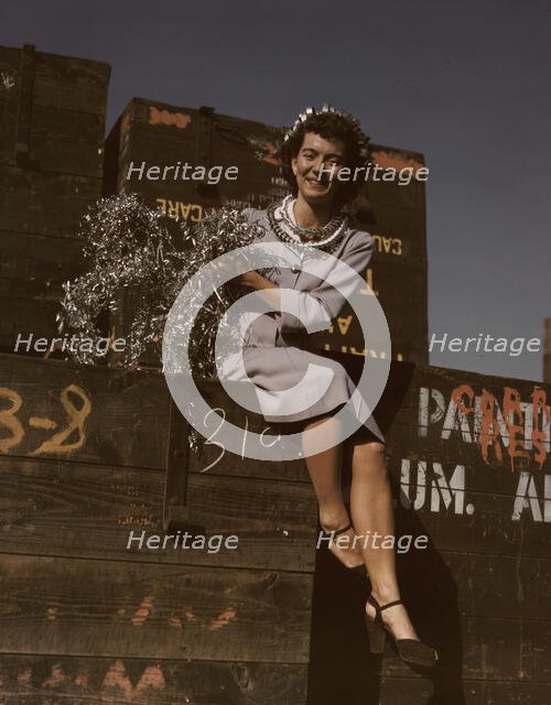 Annette del Sur publicizing salvage campaign...Douglas Aircraft Company, Long Beach, Calif., 1942. Creator: Alfred T Palmer.