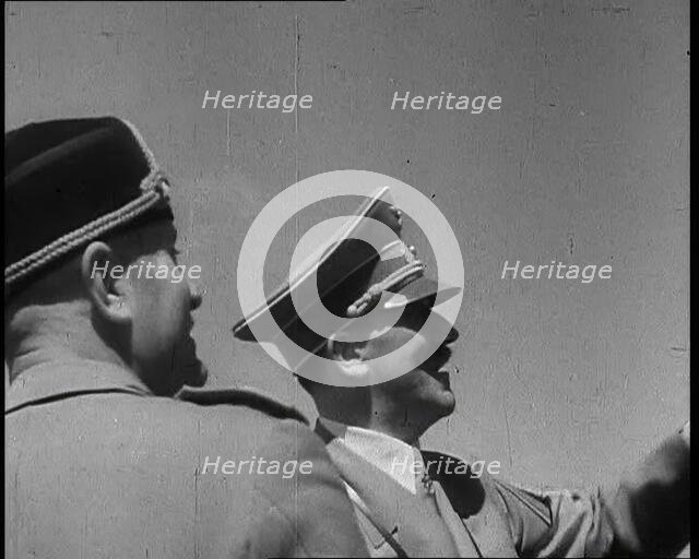 Adolf Hitler, the German Leader, and Benito Mussolini, the Italian Leader, talking, 1937. Creator: British Pathe Ltd.