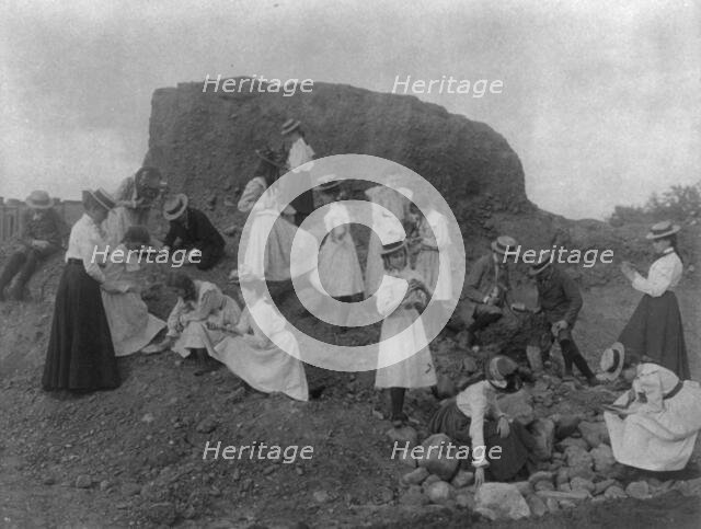 Washington, D.C. public schools field trip - 3rd Div. children examining rocks, (1899?). Creator: Frances Benjamin Johnston.