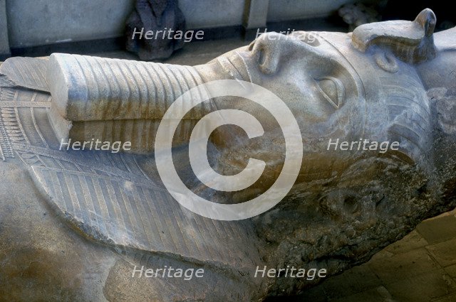 Head of colossal statue of Rameses II, Memphis, Egypt, c13th century BC. Artist: Unknown