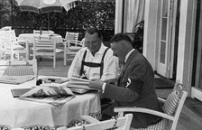 Hermann Goering and Adolf Hitler at his residence in Obersalzberg, Bavaria, Germany, 1936. Artist: Unknown