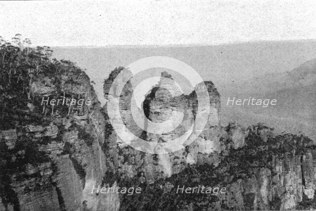 ''Les Trois Soeurs dans les Montagnes Bleues; Les Terres Du Pacifique', 1914. Creator: Unknown.