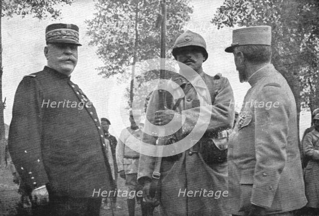 'Autour de la Bataille; Le colonial Mathieu Jouy photographie entre le general Joffre..., 1916 (1924 Creator: Unknown.