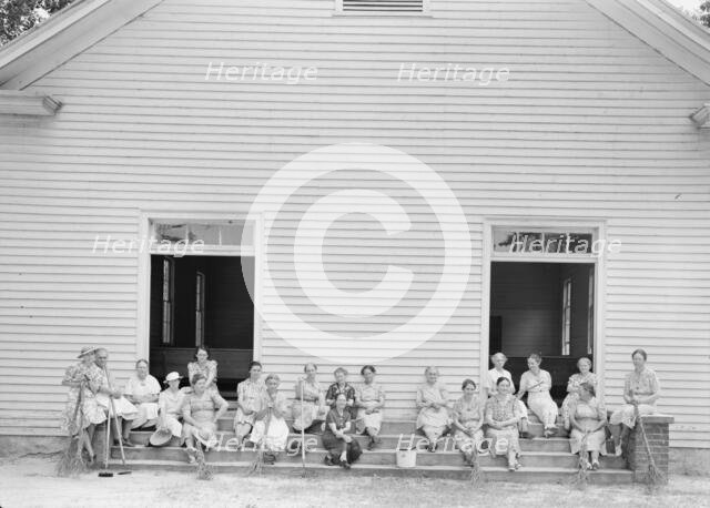 Women of the congregation of Wheeley's Church on steps..., Gordonton, North Carolina, 1939. Creator: Dorothea Lange.