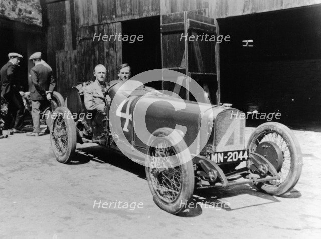 Henry Segrave in an 8 cylinder Sunbeam, Isle of Man, 1922. Artist: Unknown