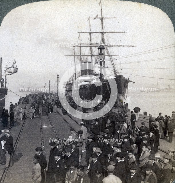 Greetings for newcomers on the pier alongside the Pacific Mail SS 'China, at Yokohama, Japan, 1904.Artist: Underwood & Underwood