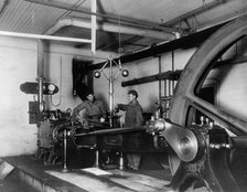 Two young men training in mechanical(?) engineering at Hampton Institute, Virginia, 1899 or 1900. Creator: Frances Benjamin Johnston.