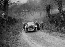 Alfa Romeo of KD Evans getting a push at the NWLMC London-Gloucester Trial, 1931. Artist: Bill Brunell.