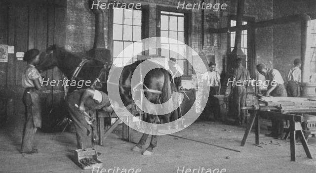 The blacksmith shop, 1904. Creator: Frances Benjamin Johnston.