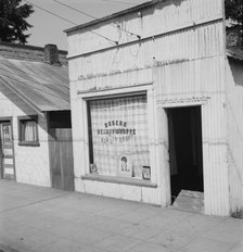 In the center of town, Tenino, Thurston County, Western Washington, 1939. Creator: Dorothea Lange.
