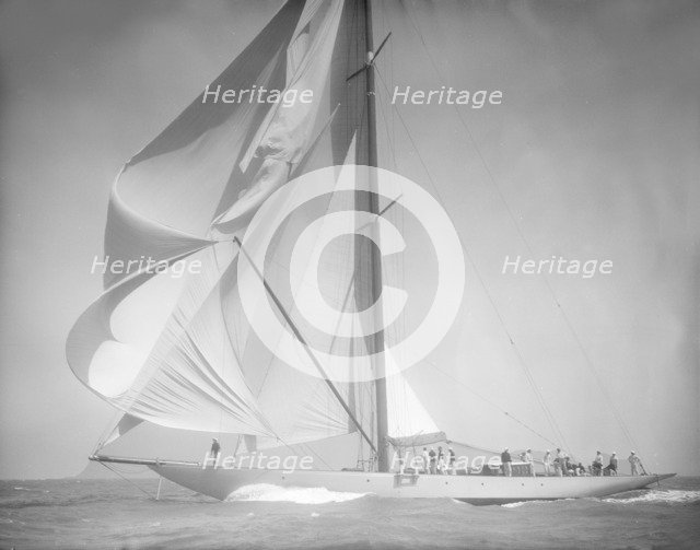 Spinnaker flying on unknown yacht. Creator: Kirk & Sons of Cowes.