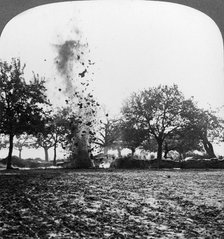 A German shell exploding, World War I, 1914-1918.Artist: Realistic Travels Publishers
