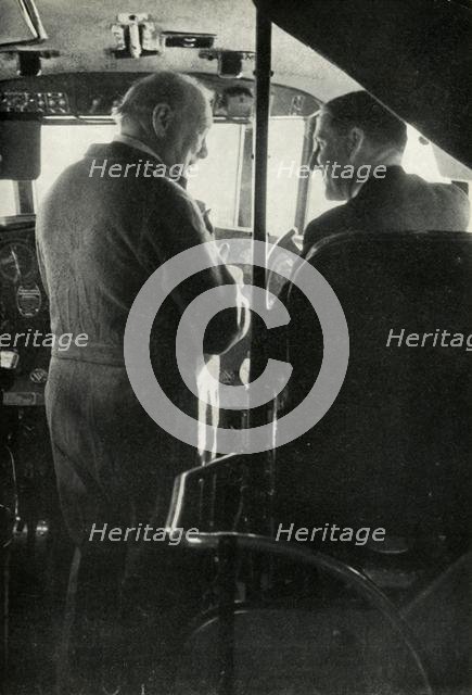 Winston Churchill talking to Captain Shakespeare of the flying boat 'Berwick', c1939-c1944 (1946). Creator: Unknown.