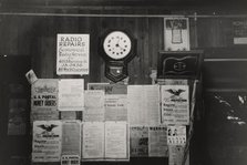 Posters and decorations in combined general store and post office, Olga, Louisiana,  1938-09. Creator: Russell Lee.