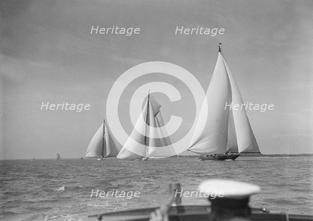 Magnificent group of 1st Class Races: 'Shamrock V', 'White Heather' and 'Candida', 1930.  Creator: Kirk & Sons of Cowes.