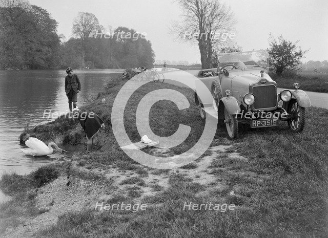 Calcott open tourer by the River Thames at Runnymede, c1922. Artist: Bill Brunell.