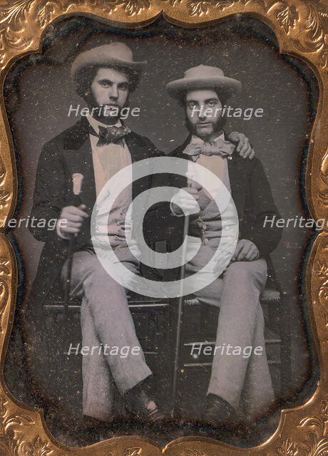 Two Seated Young Men Holding Ivory-topped Walking Sticks, 1850s. Creator: Unknown.