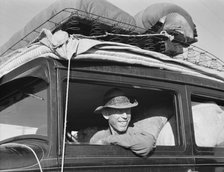 Farmer from Independence, Kansas, on the road at cotton chipping time, U.S. 99, California, 1939. Creator: Dorothea Lange.