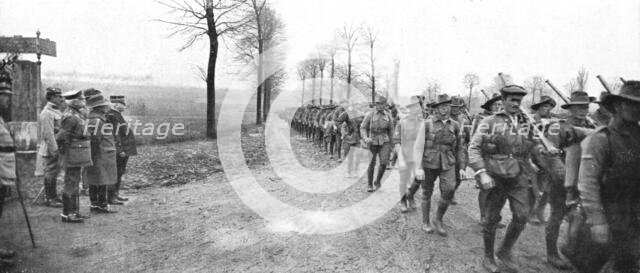 ''Aux armees Britanniques; Un defile de troupes canadiennes devant le general Joffre', 1916 (1924) Creator: Unknown.