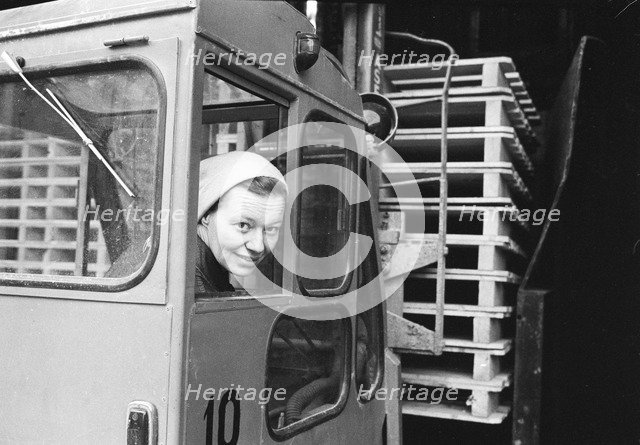 A female forklift truck driver, Landskrona, Sweden, 1967. Artist: Unknown