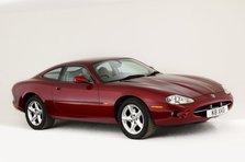 1999 Jaguar XK8 coupe Artist: Unknown.