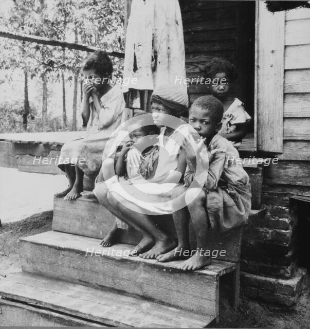 Children of turpentine worker near Cordele, Alabama, 1936. Creator: Dorothea Lange.