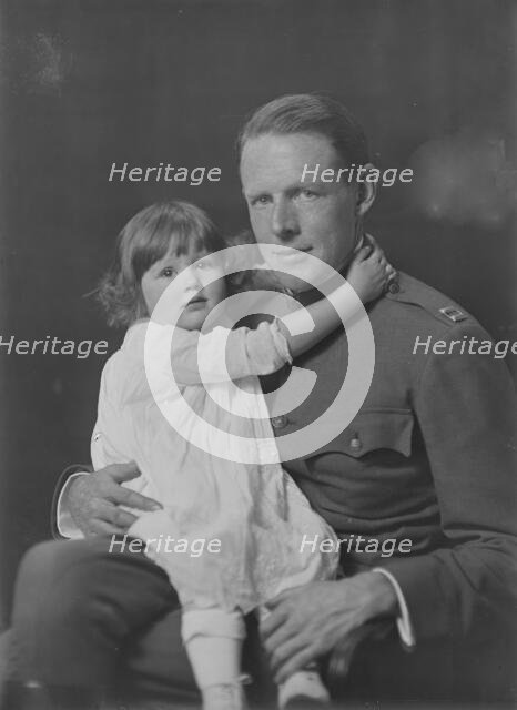 Captain Rainsforth and baby, portrait photograph, 1918 Oct. 21. Creator: Arnold Genthe.