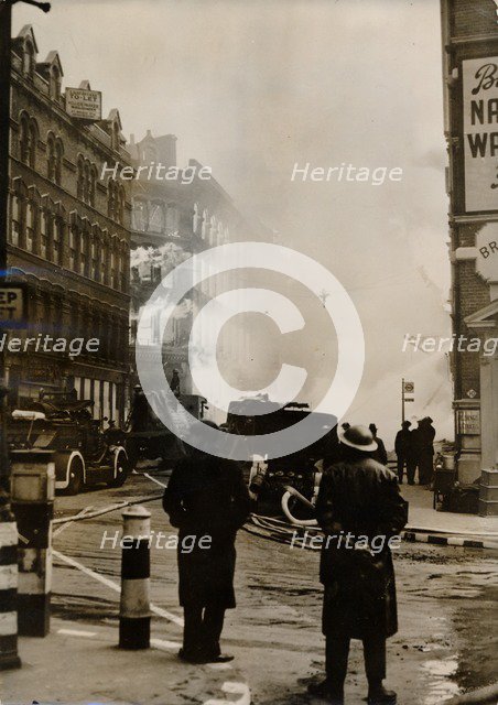 Fire caused by German incendiary bombs, London, World War II, c1940-c1944. Artist: Unknown