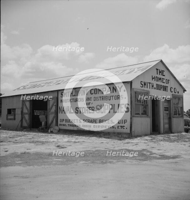 Large turpentine still and processing plant near Valdosta, Georgia, 1937. Creator: Dorothea Lange.