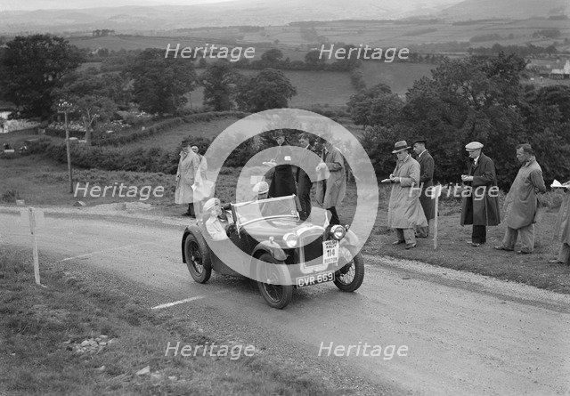 Austin 7 Nippy of DN Kennedy competing in the South Wales Auto Club Welsh Rally, 1937 Artist: Bill Brunell.