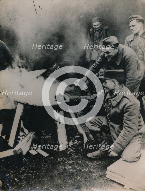 French prisoners cooking, c.1940s. Artist: Unknown