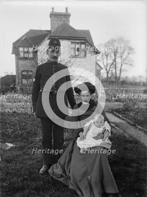 A group portrait of a policeman and his family, Warwickshire, 1905. Artist: A Newton