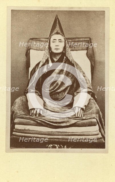 Full-length portrait of the grand lama of the Selenginsk lamasery, seated..., between 1870 and 86. Creator: Unknown.
