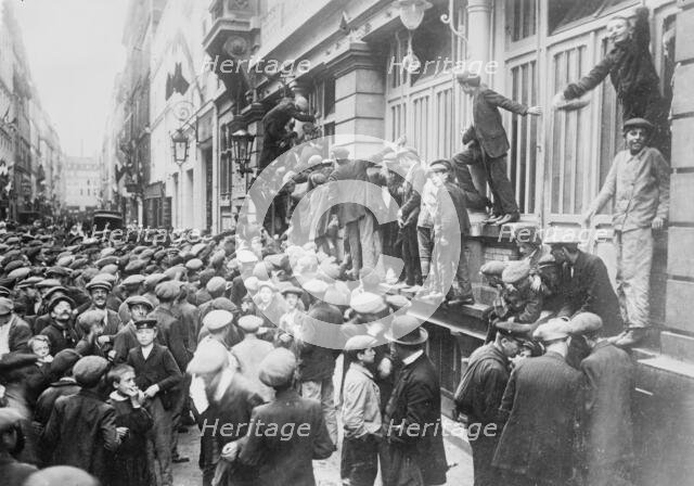 Paris, Newsboys waiting for "Extras", between c1914 and c1915. Creator: Bain News Service.